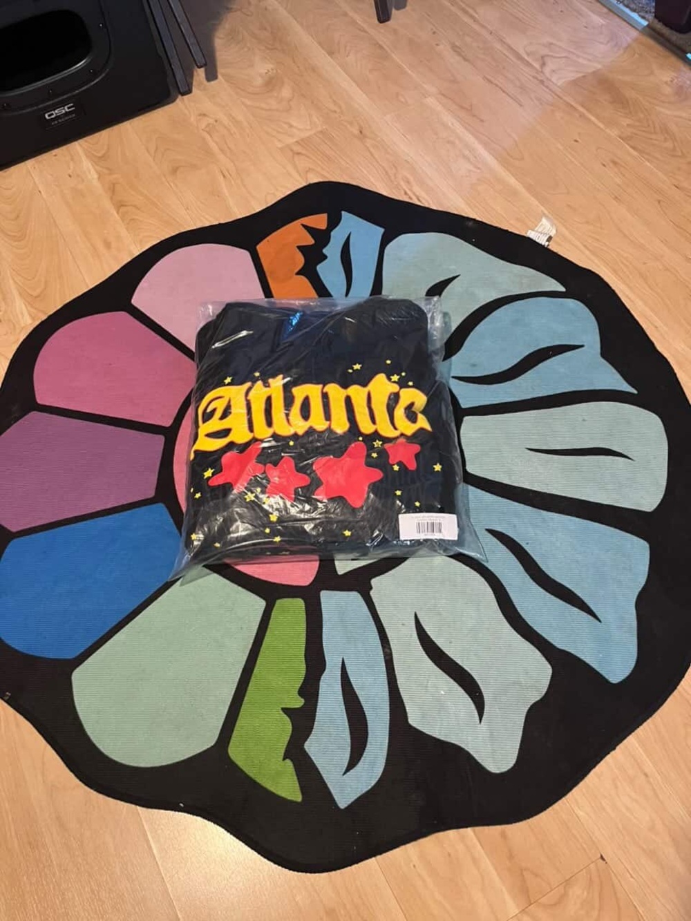 Black 'Atlante' Graphic Men's Sweater with Yellow Logo and Red Stars